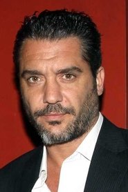 Maxi Ghione as Police Commissioner Funes in Terrified