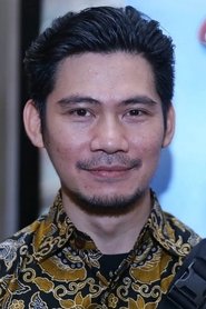 Donny Alamsyah as Andi in The Raid