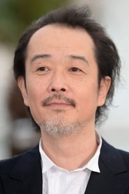 Lily Franky as Osamu Shibata in Shoplifters