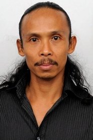 Yayan Ruhian as Mad Dog in The Raid