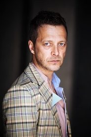 Levente Molnár as Abraham in Son of Saul