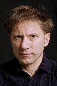 Simon McBurney as Atlee in Mission: Impossible - Rogue Nation