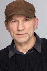Simon McBurney as Frank Hawking in The Theory of Everything