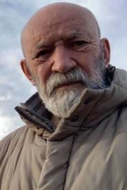 Çun Lajçi as Haxhi in Hive