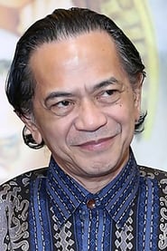 Ray Sahetapy as Tama in The Raid