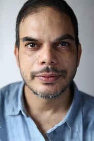 Ankur Vikal as Maman in Slumdog Millionaire