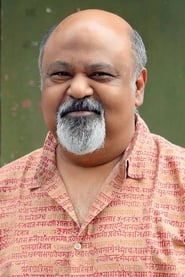Saurabh Shukla as Sergeant Srinivas in Slumdog Millionaire